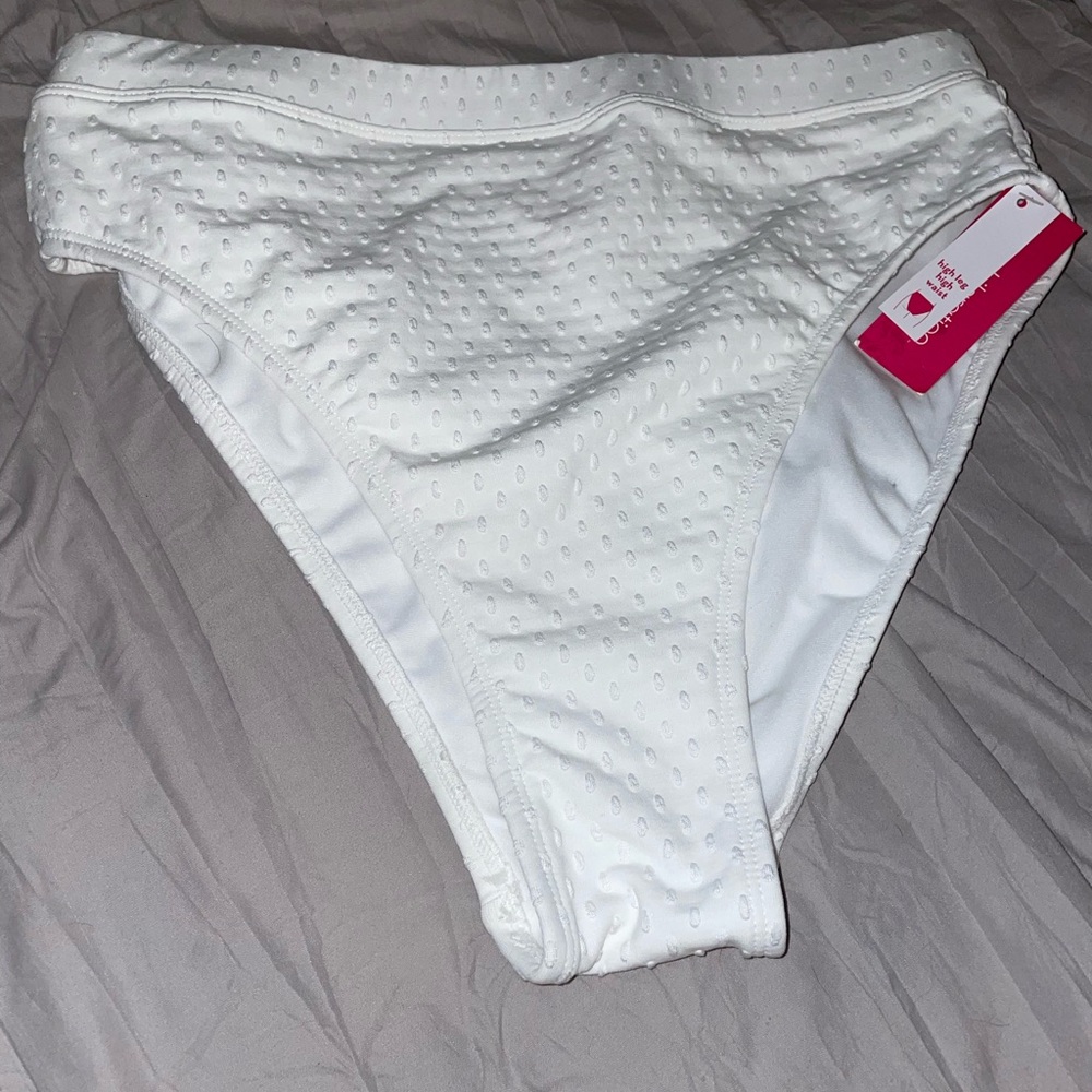 White swim bottoms. Size large. New with tags